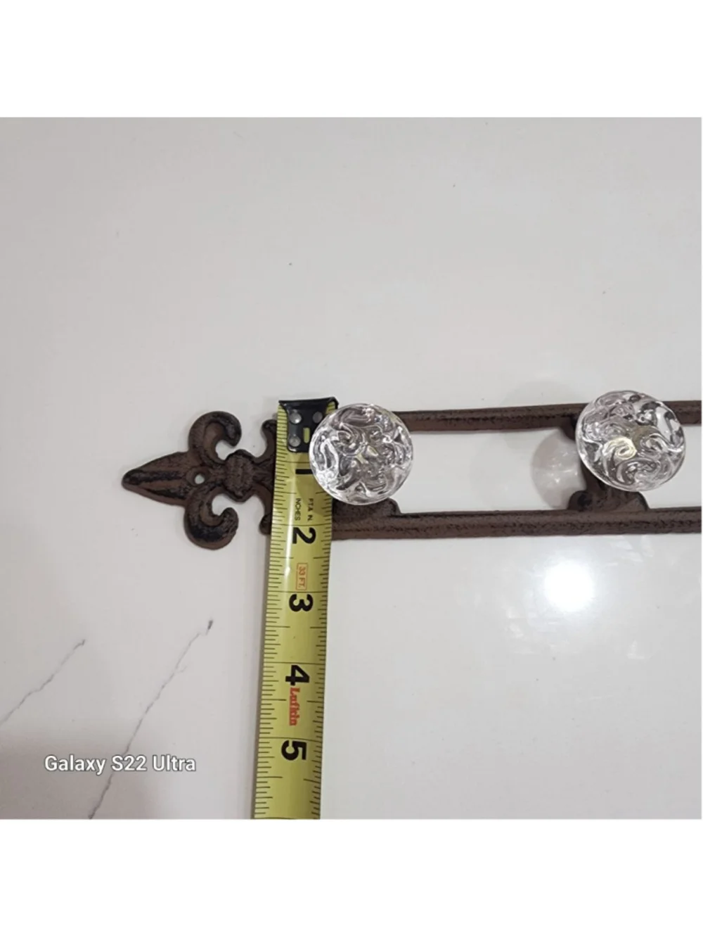Cast Iron Fleur-de-lis wall mount with 3 crystal looking knobs 15.5”